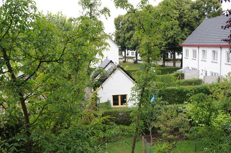 Het Eiland Malem tussen twee Leiearmen verstedelijkte vanaf 1952 als een tuinwijk.  